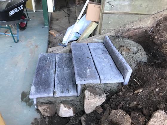 rocks used as boxing to secure concrete